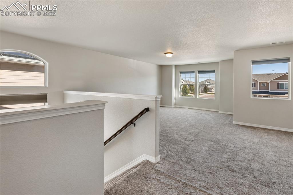 10858 Traders Parkway Fountain, CO 80817 - Photo 34 of 38 a view of an empty room with a window