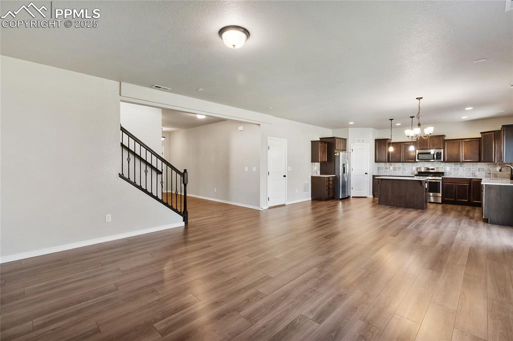 10858 Traders Parkway Fountain, CO 80817 - Photo 9 of 38 a view of a kitchen with a sink and a stove top oven
