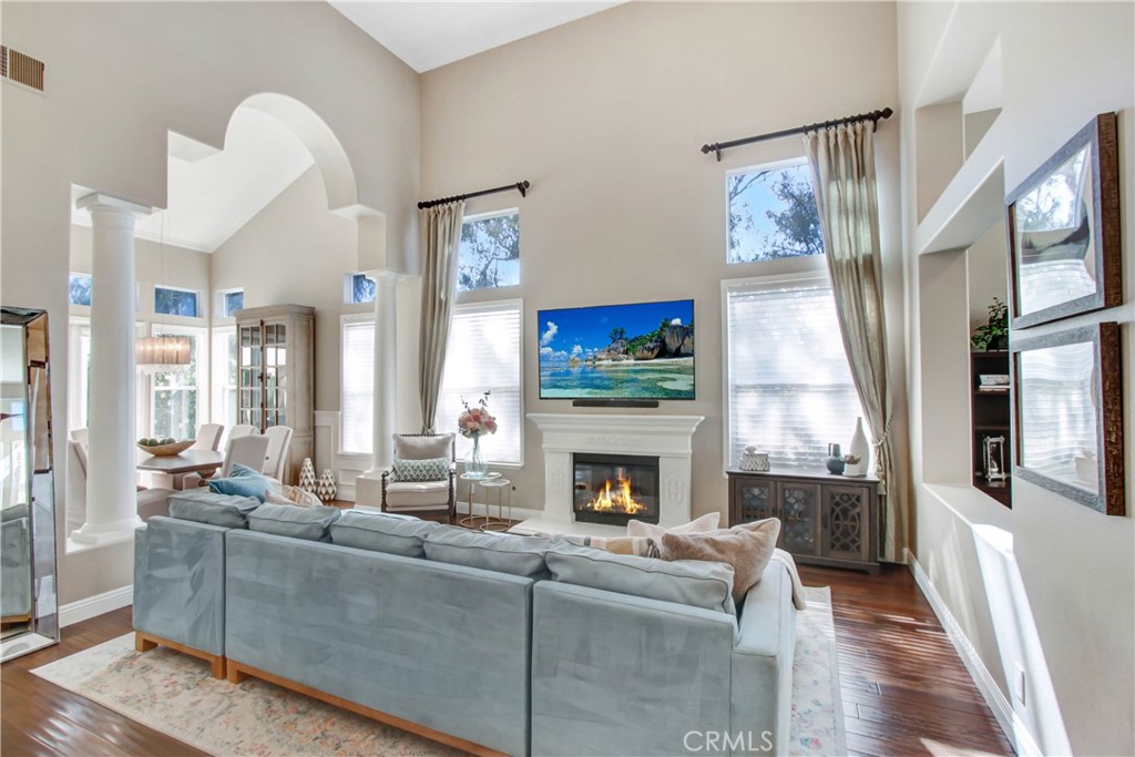 12036 Wood Ranch Road Granada Hills, CA 91344 - Photo 49 of 55 Living Room with Sofa Bed & two story ceilings