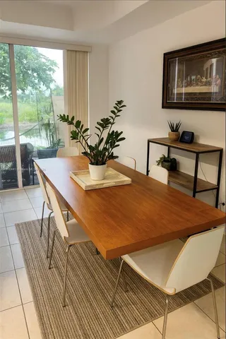 a dining room with furniture