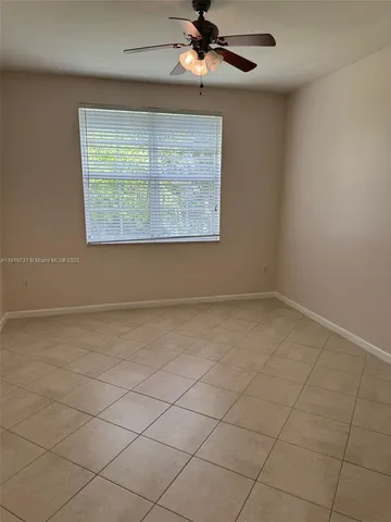 en empty room with windows