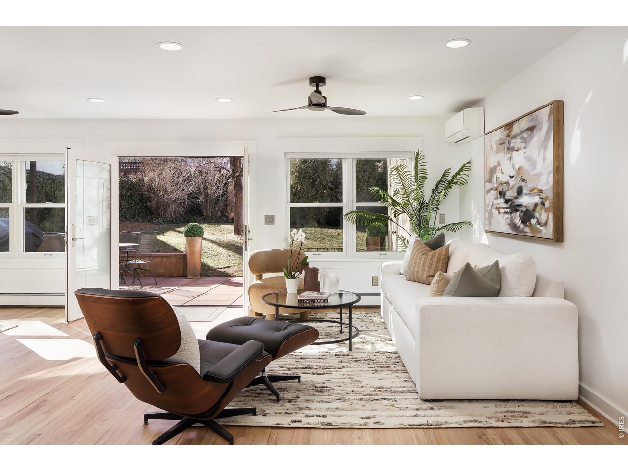 751 Grant Place Boulder, CO 80302 - Photo 15 of 38 A spacious indoor-outdoor family room flows seamlessly to a generous patio with Flatiron views for al fresco dining and lounging.