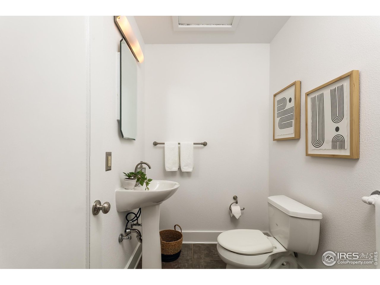 751 Grant Place Boulder, CO 80302 - Photo 18 of 38 A convenient powder room.