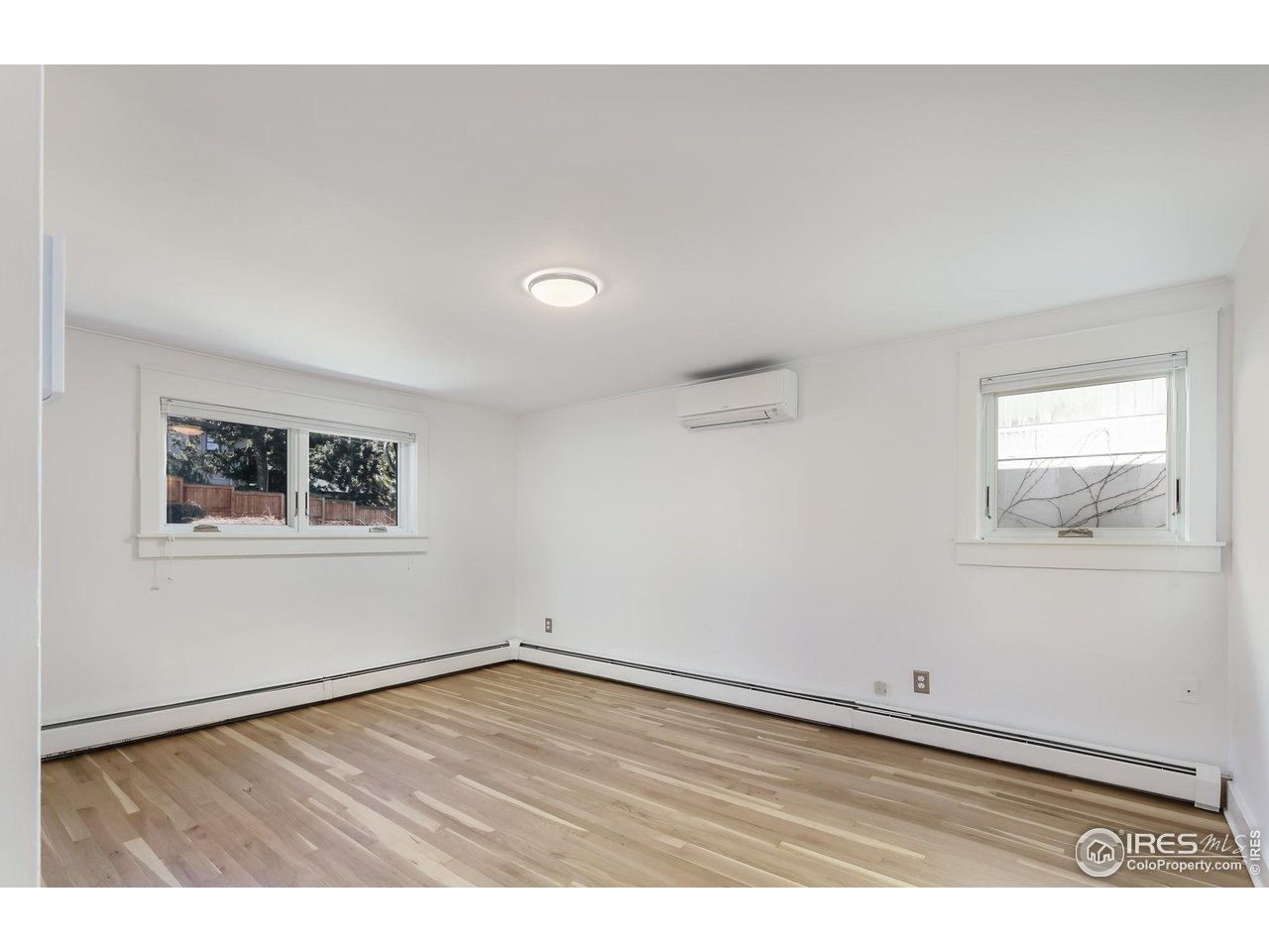 751 Grant Place Boulder, CO 80302 - Photo 19 of 38 Guest bedroom with recently remodeled en suite bathroom