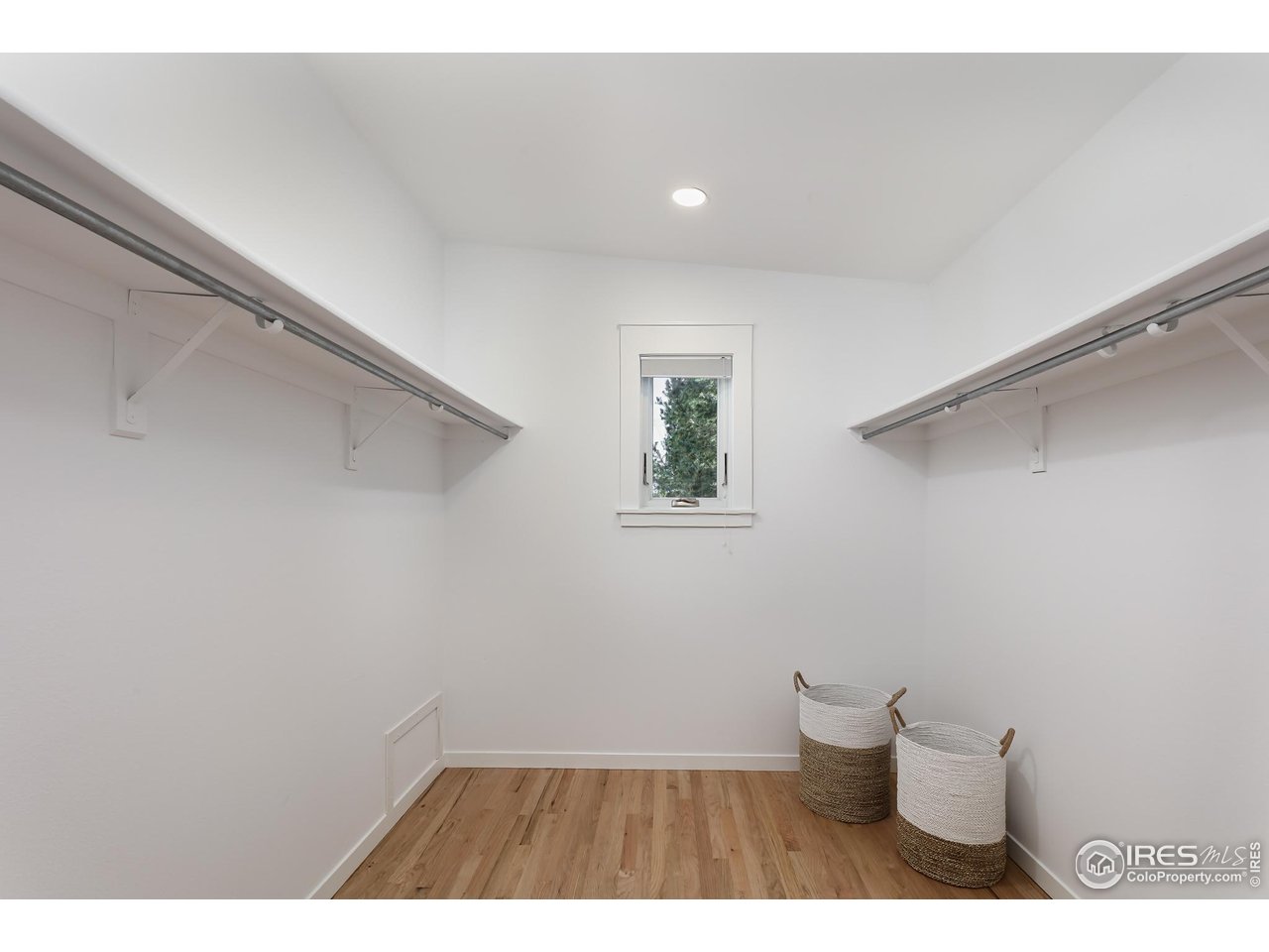 751 Grant Place Boulder, CO 80302 - Photo 27 of 38 Oversized walk-in closet with abundant wardrobe storage and window.