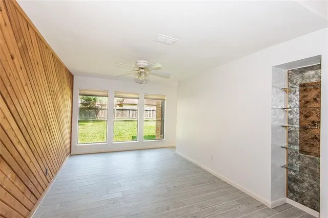 an empty room with windows