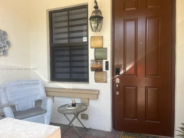 a front view of a house with entryway