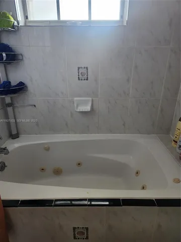 a bathroom with a bathtub