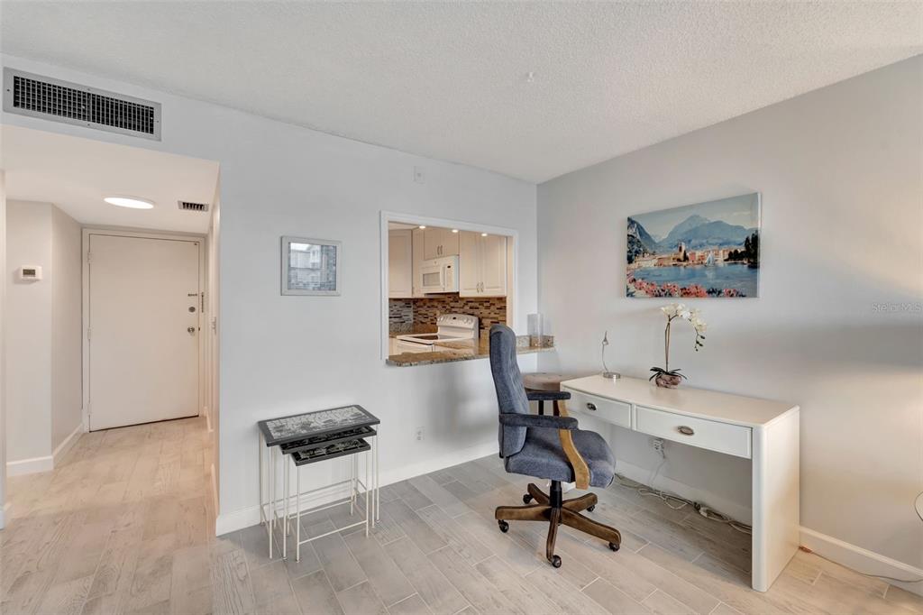 5855 Midnight Pass Road, Unit 314 Sarasota, FL 34242 - Photo 18 of 58 a view of a workspace with furniture