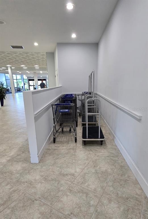 5855 Midnight Pass Road, Unit 314 Sarasota, FL 34242 - Photo 38 of 58 a room with furniture and a table