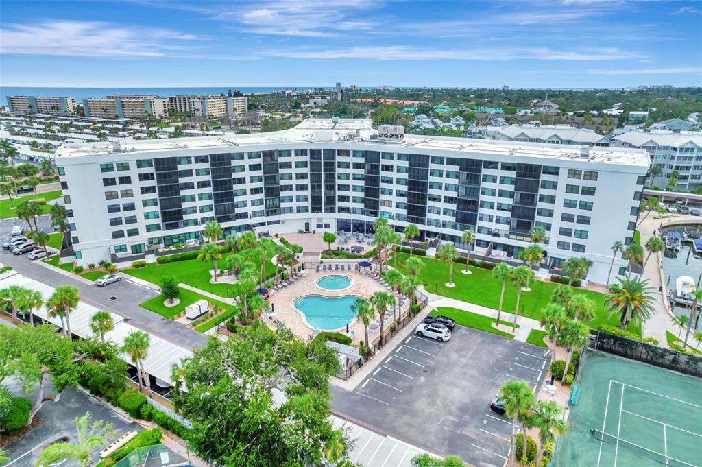 5855 Midnight Pass Road, Unit 314 Sarasota, FL 34242 - Photo 43 of 58 a view of a city with tall buildings