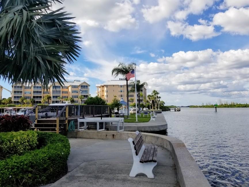 5855 Midnight Pass Road, Unit 314 Sarasota, FL 34242 - Photo 55 of 58 a view of a swimming pool with furniture