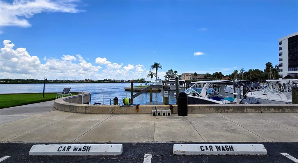 5855 Midnight Pass Road, Unit 314 Sarasota, FL 34242 - Photo 58 of 58 a view of a swimming pool with an outdoor seating