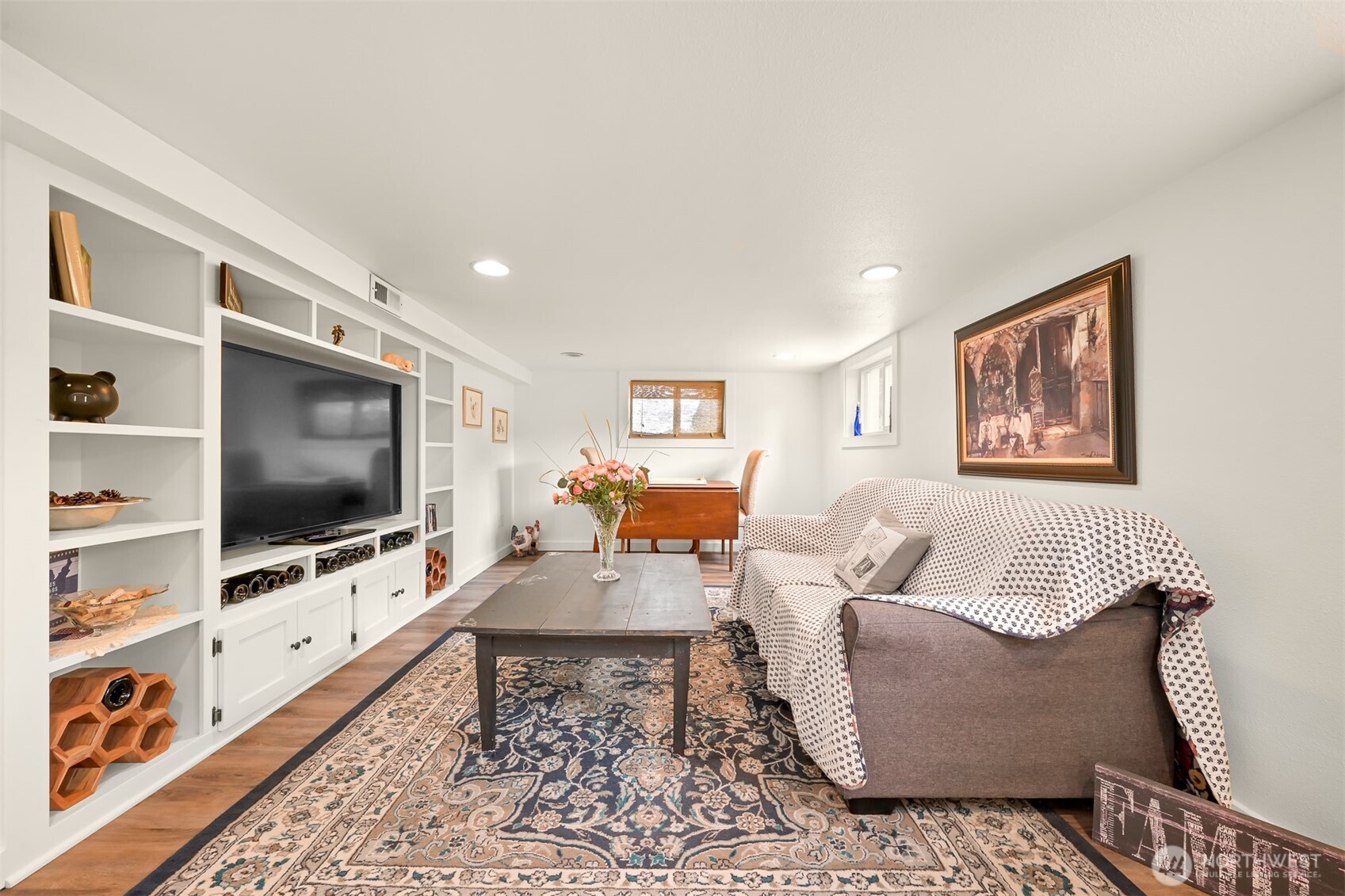 8490 Benson Road Lynden, WA 98264 - Photo 23 of 40 a living room with furniture and a flat screen tv