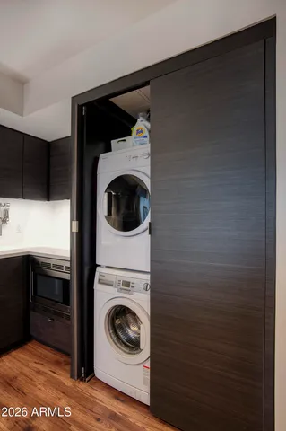 a living room with fireplace furniture and a flat screen tv