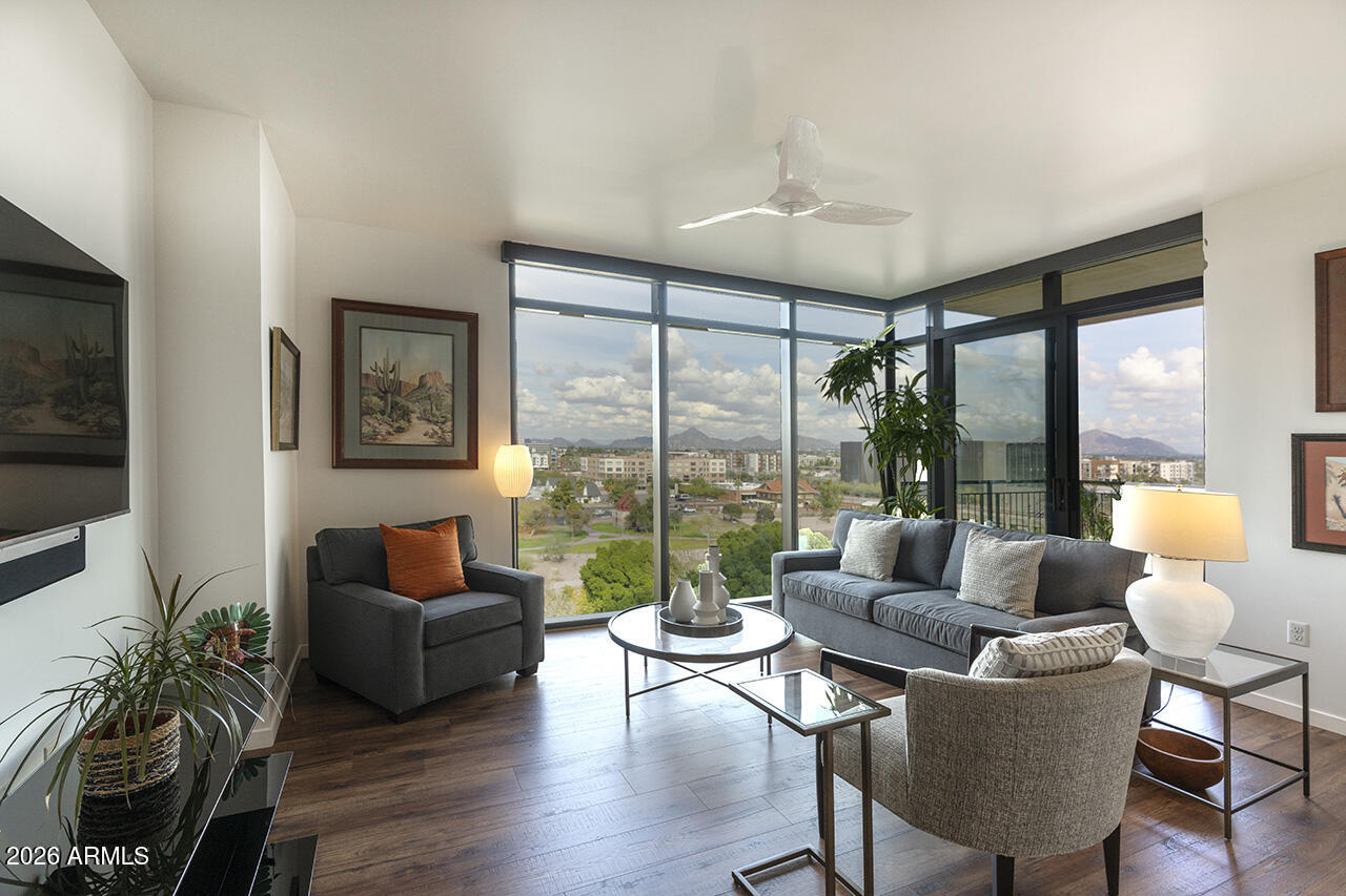 200 West Portland Street, Unit 822 Phoenix, AZ 85003 - Photo 12 of 61 a living room with furniture and a large window