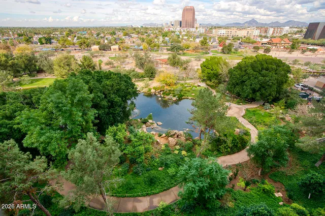 a bedroom with a bed and a walk in closet