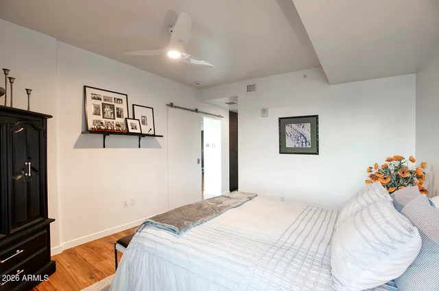 a bathroom with a sink double vanity and a mirror