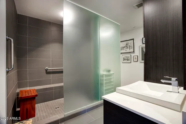 a picture of a living room with a flat screen tv and outdoor view