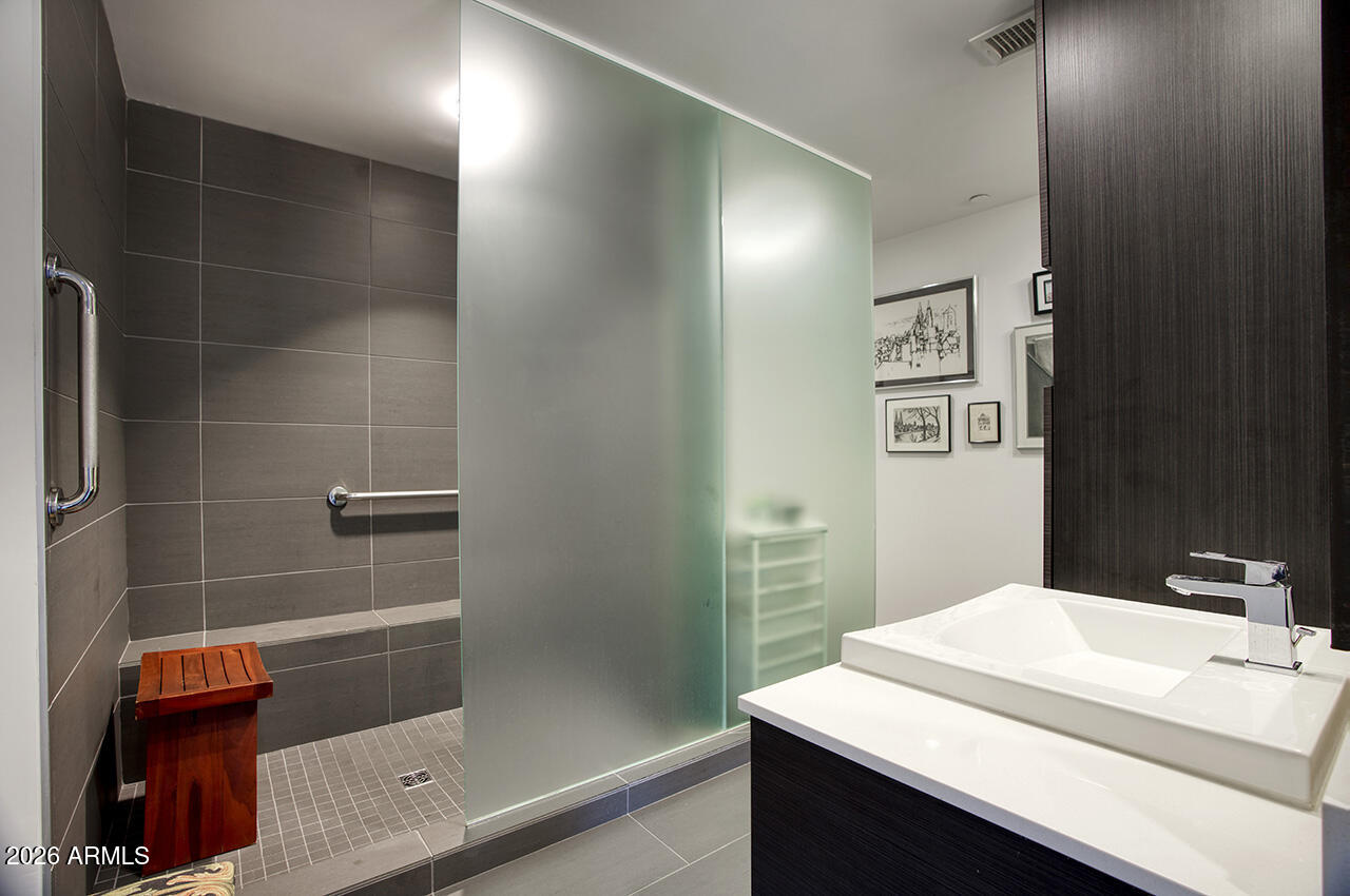 200 West Portland Street, Unit 822 Phoenix, AZ 85003 - Photo 25 of 61 a bathroom with a sink toilet and shower