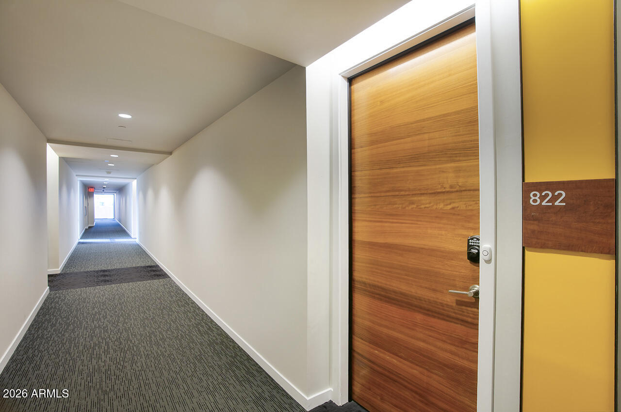 200 West Portland Street, Unit 822 Phoenix, AZ 85003 - Photo 2 of 61 a view of a hallway with windows