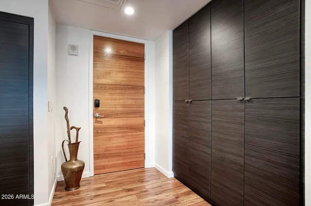 a view of a hallway with windows