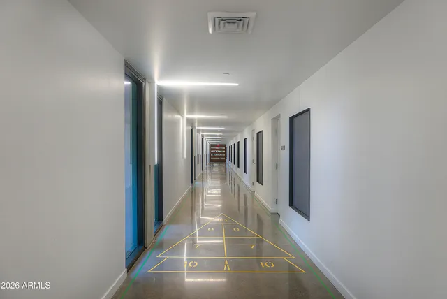 a view of a building with a yard