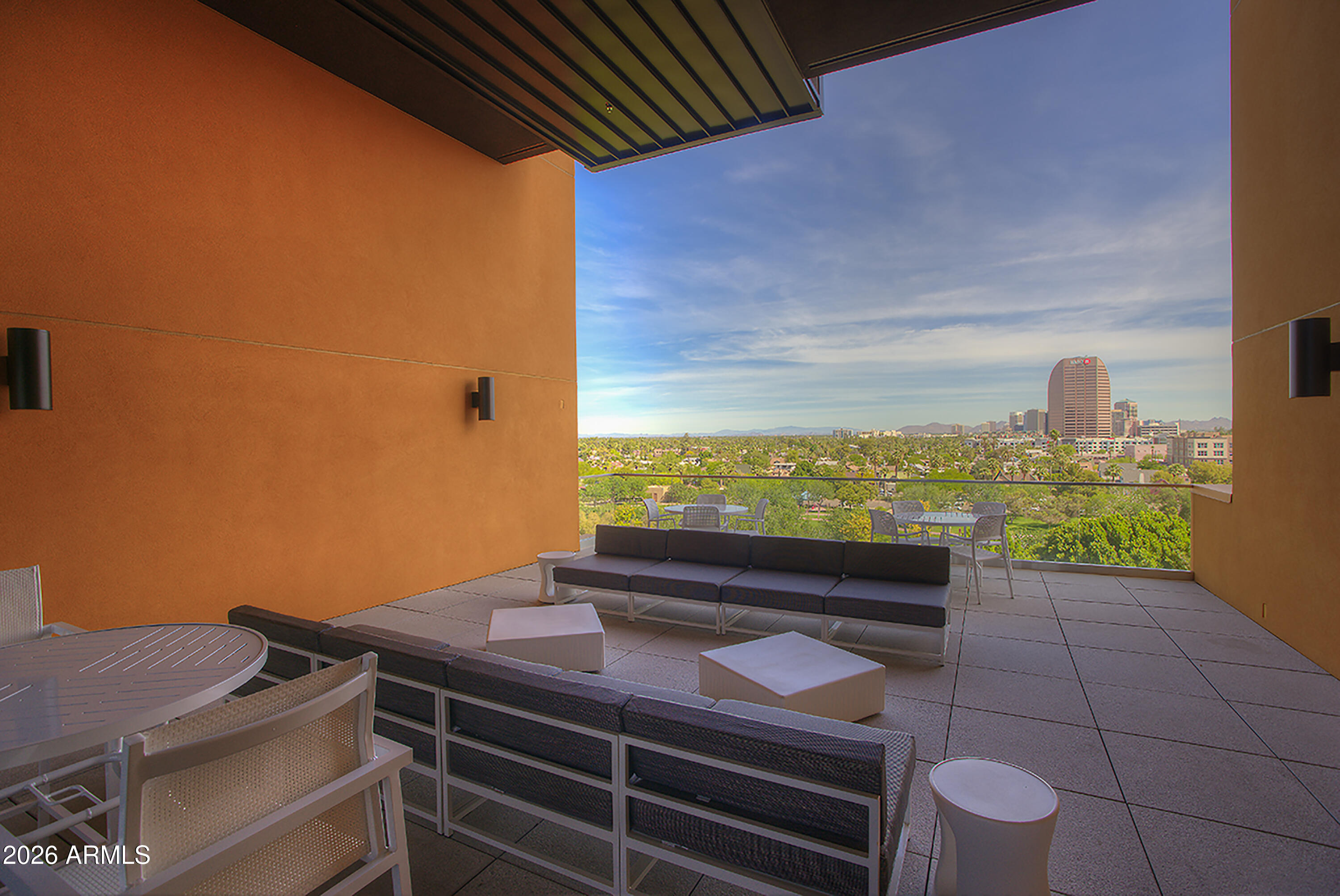 200 West Portland Street, Unit 822 Phoenix, AZ 85003 - Photo 58 of 61 a view of a roof deck with wooden floor and fence