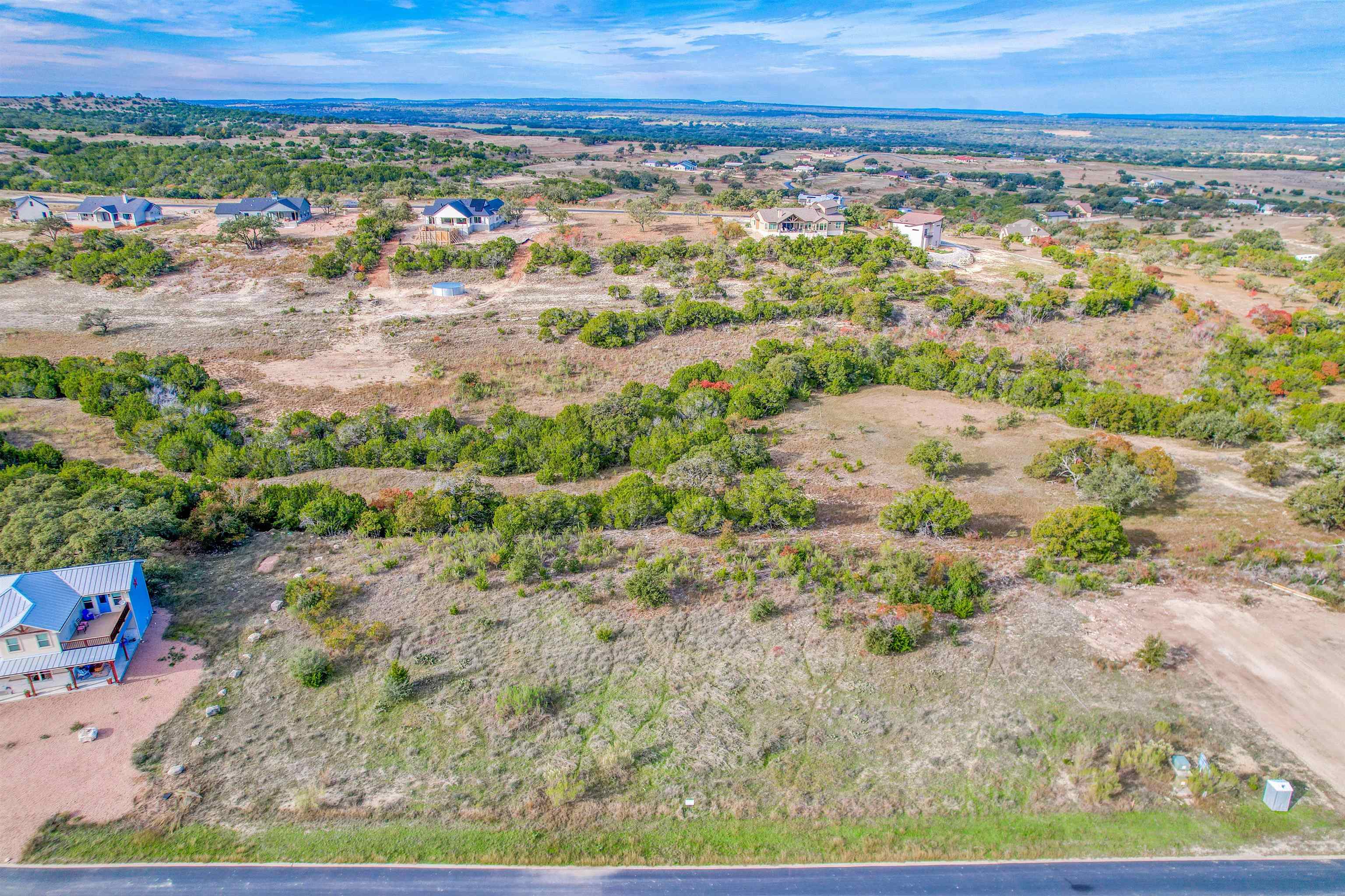 Lot 204 Summit Springs Marble Falls, TX 78654 - Photo 8 of 14 a view of a city with an ocean beach