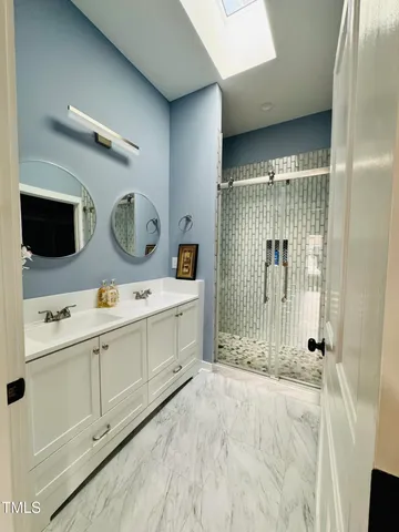 a view of a bathroom with a shower