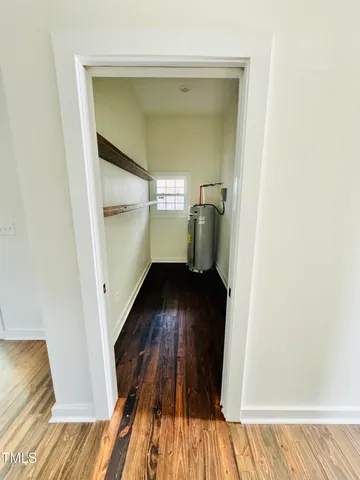 a view of kitchen with sink microwave and stove