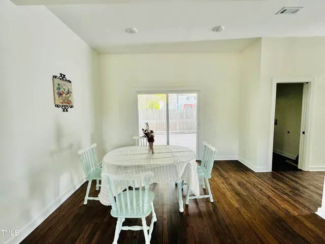 a view of a yard with trees