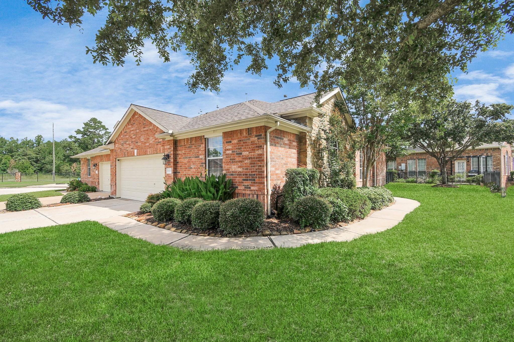 8624 Sunset Loch Drive Spring, TX 77379 - Photo 38 of 44 a front view of a house with a yard