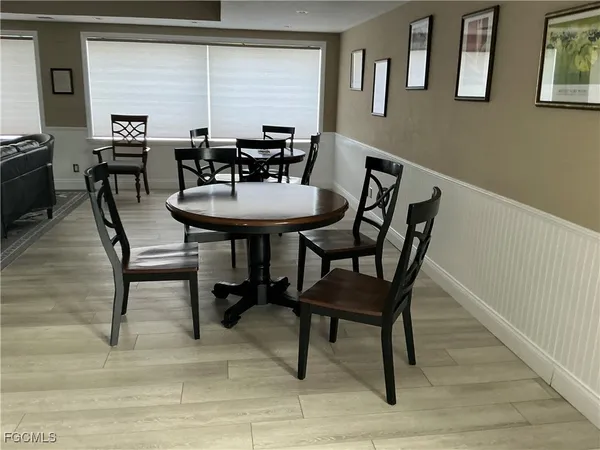 a view of a workspace with furniture