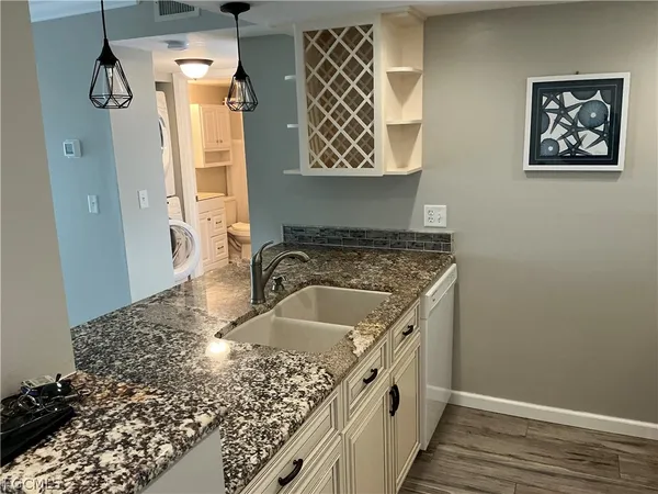 a view of washer and dryer in a bathroom