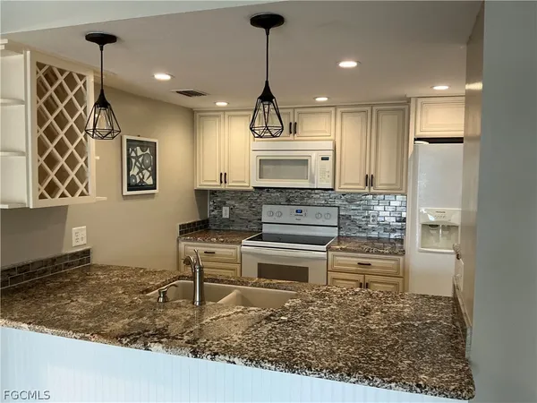 a bathroom with a toilet and a bathtub