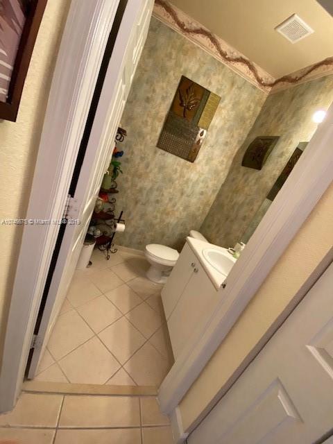 12999 Southwest 132nd Terrace, Unit 12999 Miami, FL 33186 - Photo 8 of 23 a view of entryway