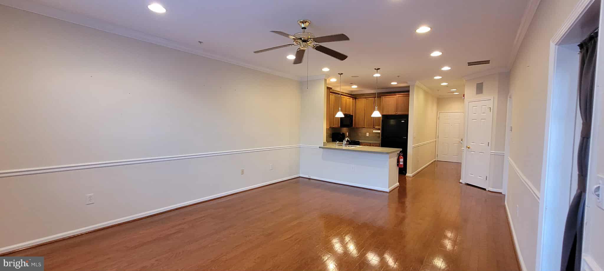 515 Highland Estates Clementon, NJ 08021 - Photo 12 of 25 wooden floor in an empty room with a window