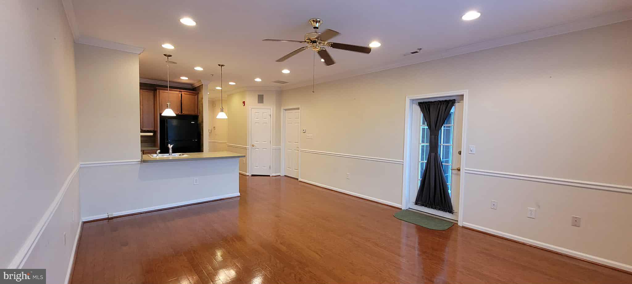 515 Highland Estates Clementon, NJ 08021 - Photo 13 of 25 wooden floor in an empty room with a window