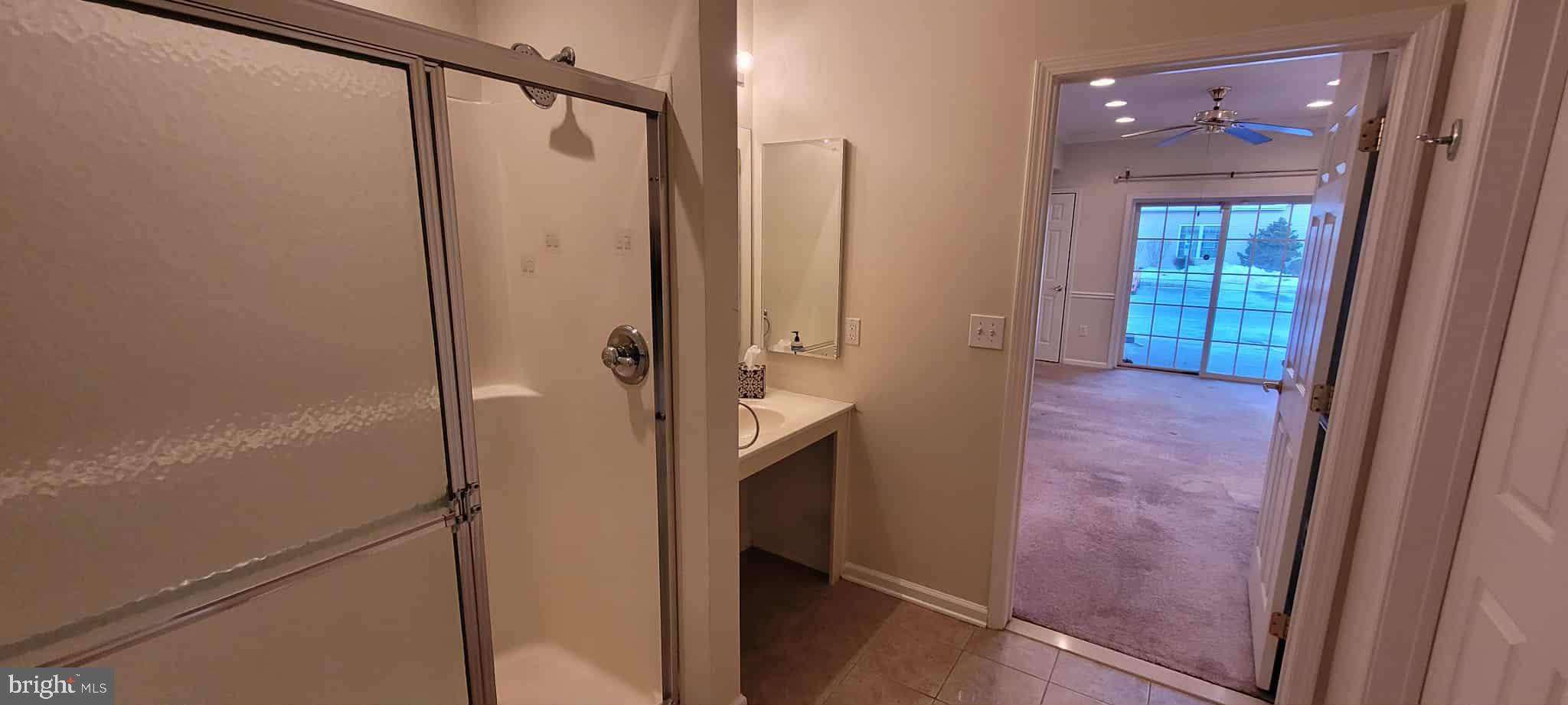 515 Highland Estates Clementon, NJ 08021 - Photo 23 of 25 a bathroom with a shower and a glass door