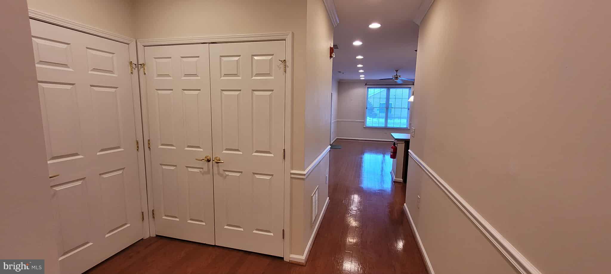 515 Highland Estates Clementon, NJ 08021 - Photo 4 of 25 a view of a hallway with wooden floor