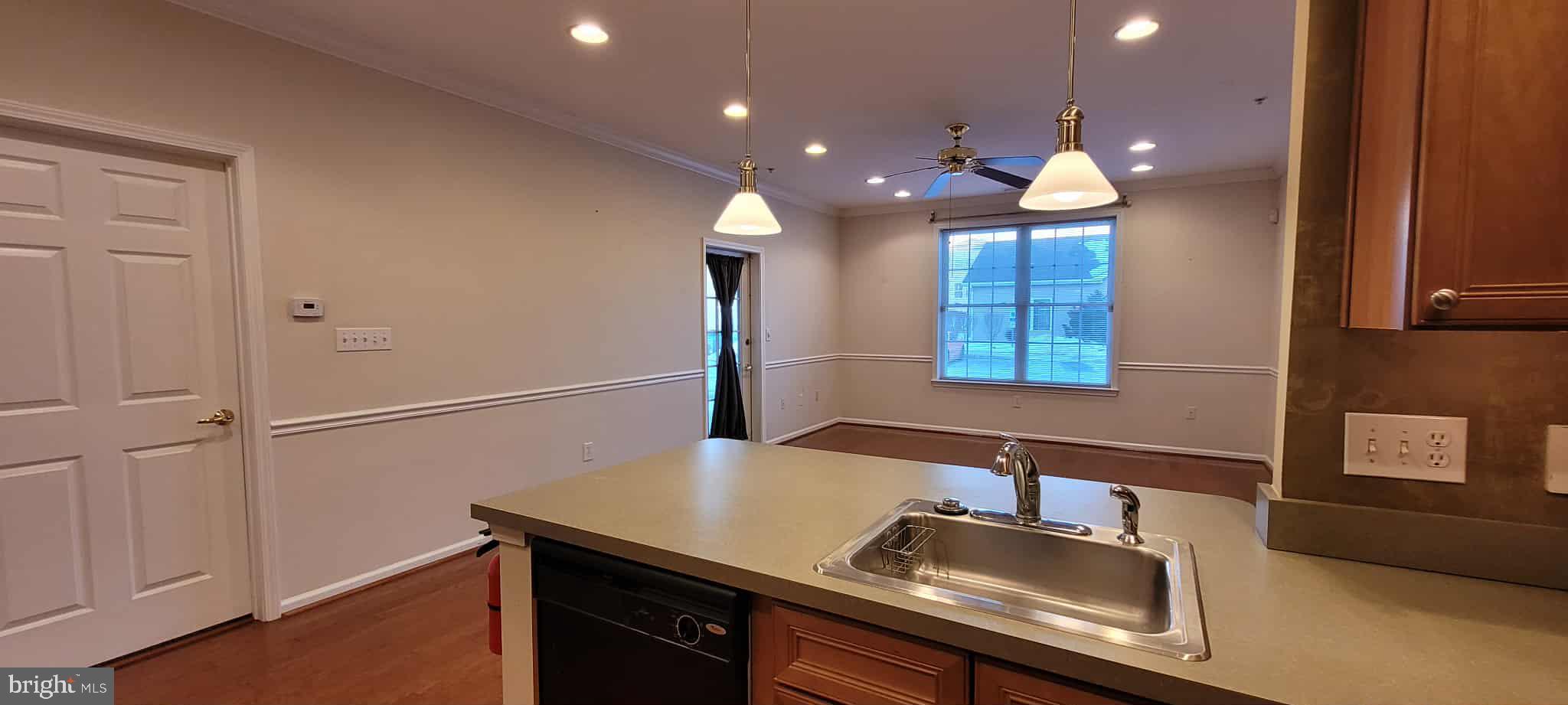 515 Highland Estates Clementon, NJ 08021 - Photo 6 of 25 a kitchen with a sink cabinets and chandelier