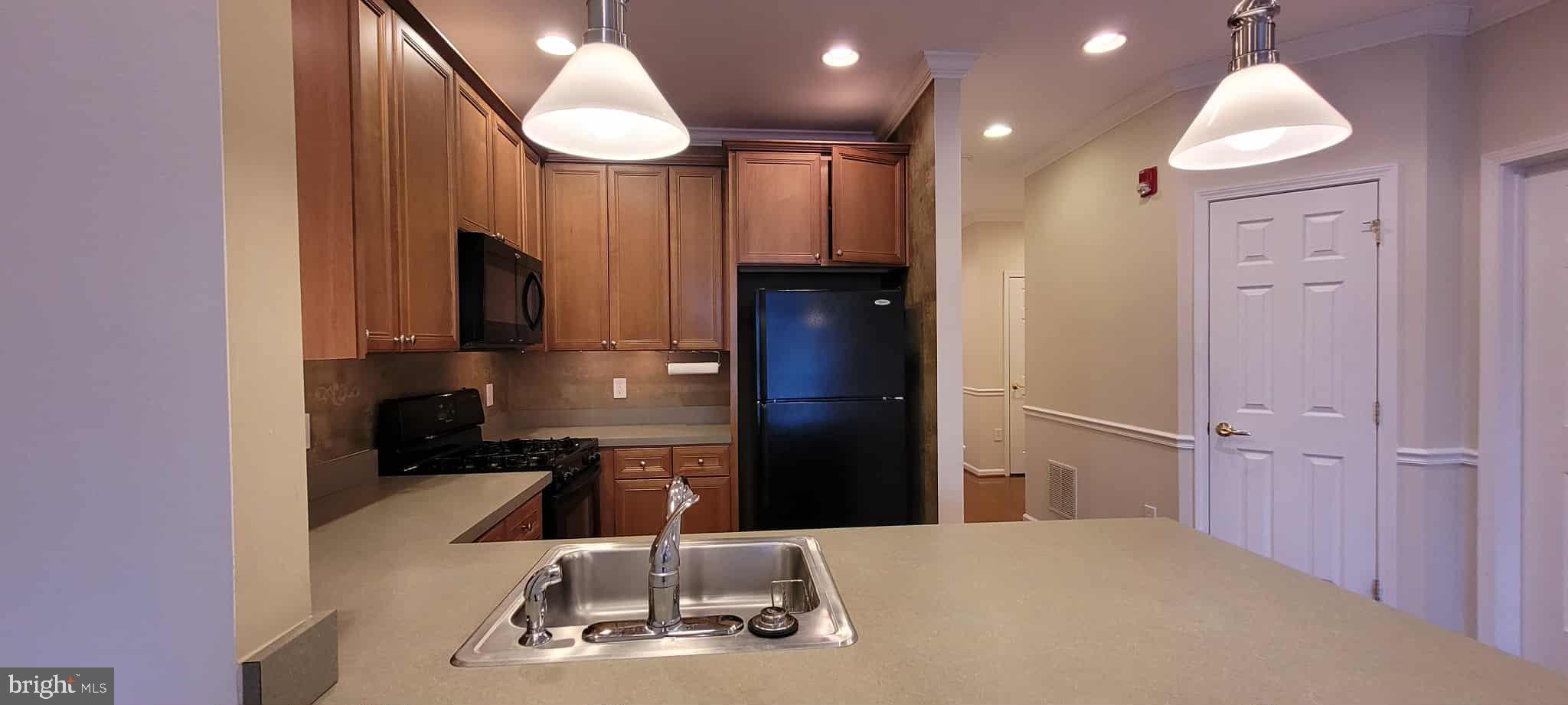 515 Highland Estates Clementon, NJ 08021 - Photo 8 of 25 a kitchen with kitchen island cabinets and appliances