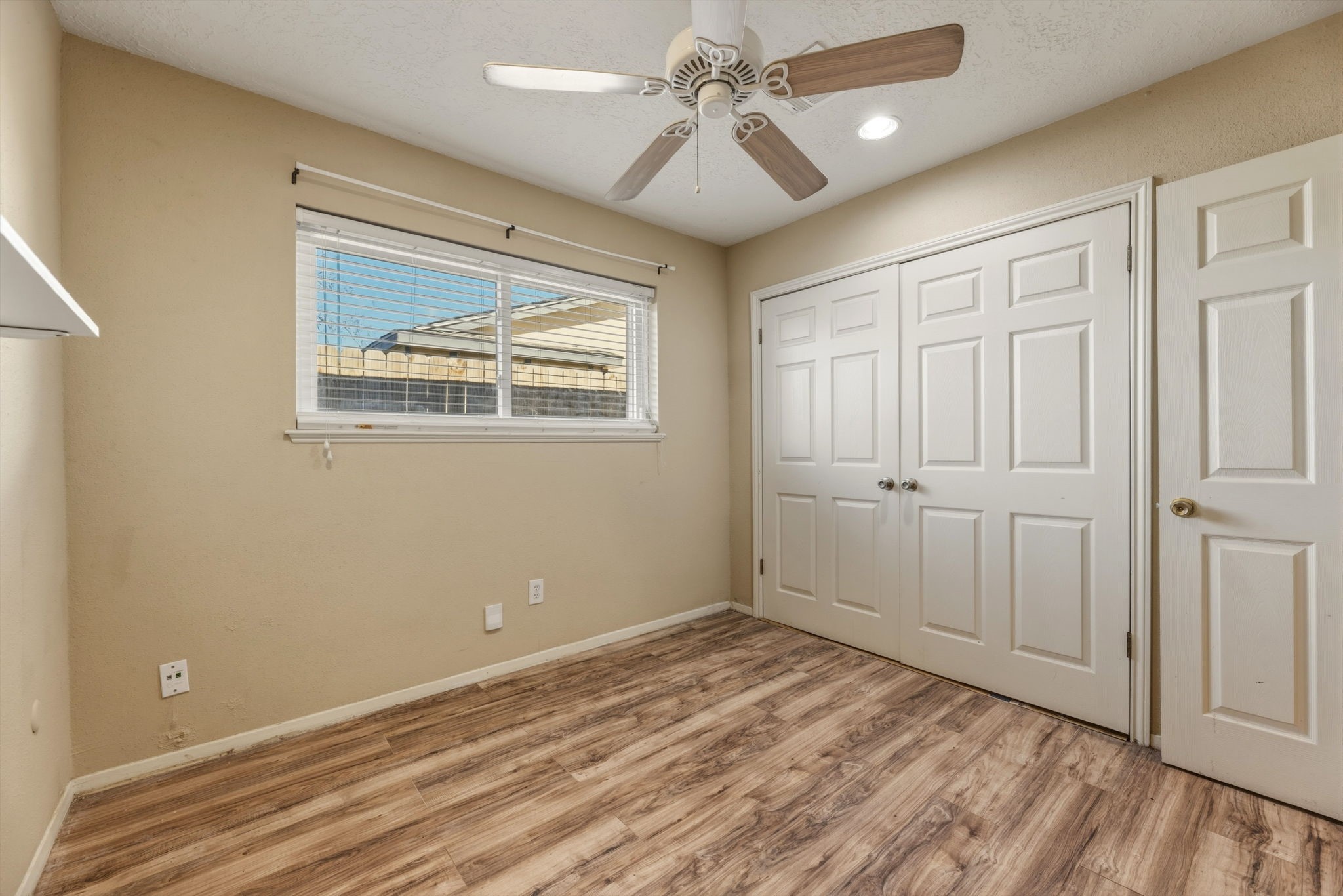 5211 Court Road Houston, TX 77053 - Photo 18 of 35 a view of empty room with wooden floor