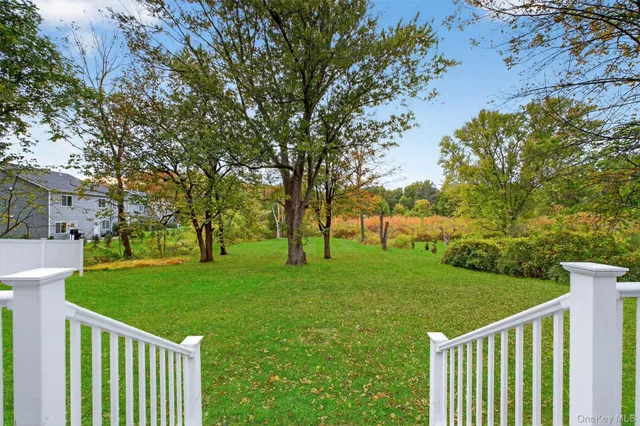 a view of a deck and a garden