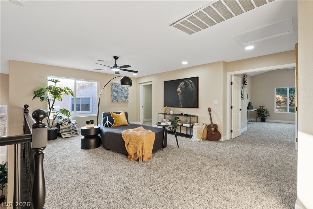 1662 Ravanusa Drive Henderson, NV 89052 - Photo 37 of 74 A well-lit upper-level flex space offers versatile living options and ample room for personalization.