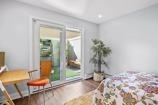 1 Davenport Street, Unit 2 Cambridge, MA 02140 - Photo 7 of 13 a room with furniture and a potted plant