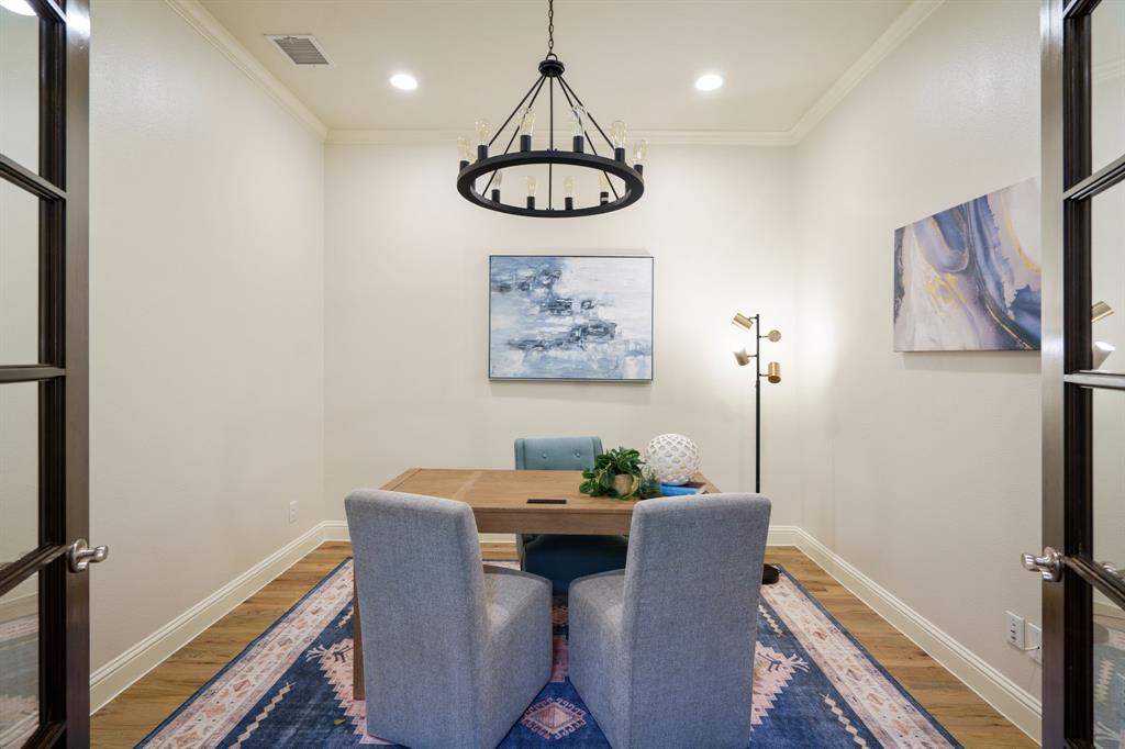6211 Velasco Avenue Dallas, TX 75214 - Photo 12 of 38 a view of a dining room with furniture and wooden floor