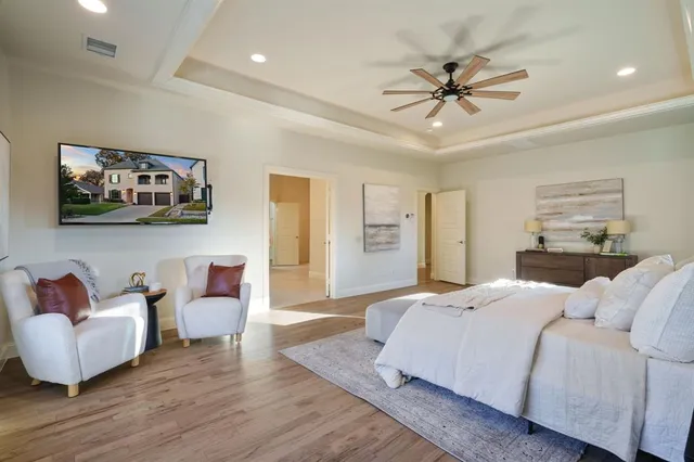 a bedroom with a bed and furniture