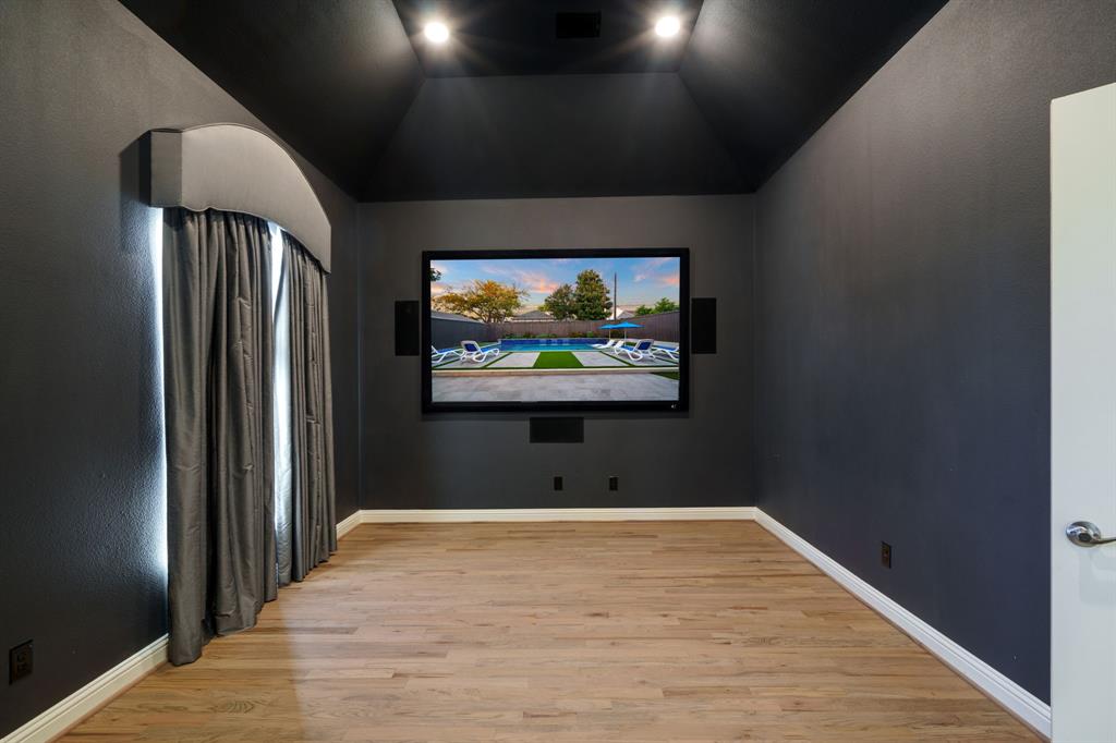 6211 Velasco Avenue Dallas, TX 75214 - Photo 26 of 38 a view of a hallway with wooden floor